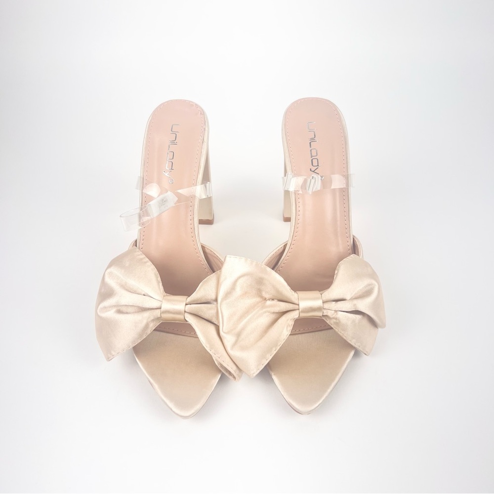 Cream Mules with Bow Design